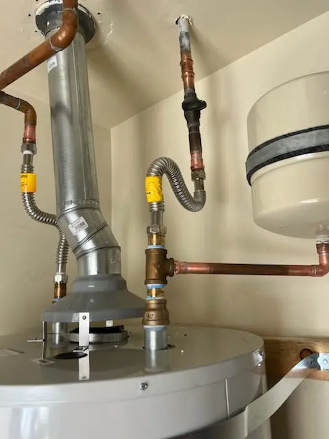 Water heater installation and plumbing repair in Cornish